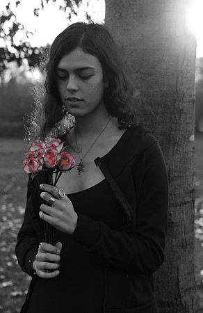 Portrait of Maria with pink flowers in Hanover, Germany