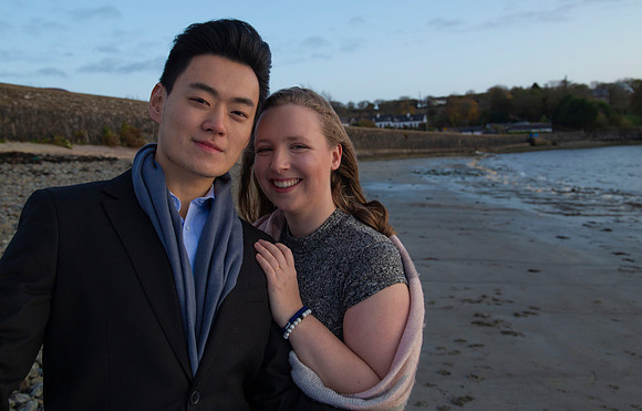 Relaxed beach portrait of a couple photographed in Cork, Ireland