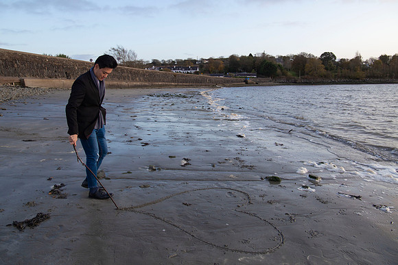 Beach engagement session featuring a couple in Cork, Ireland