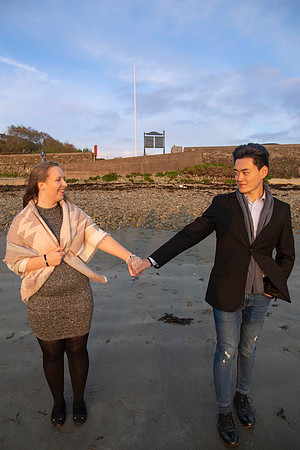 Sunset engagement photos of a couple on the Cork coast in Ireland