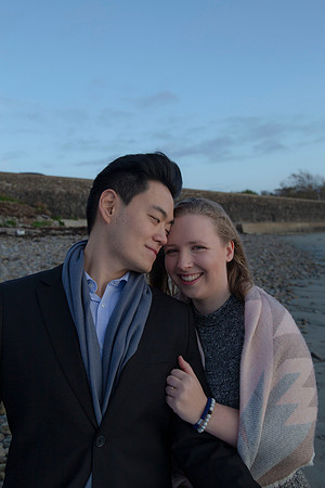 Couple portrait by the sea during an engagement shoot in Cork, Ireland
