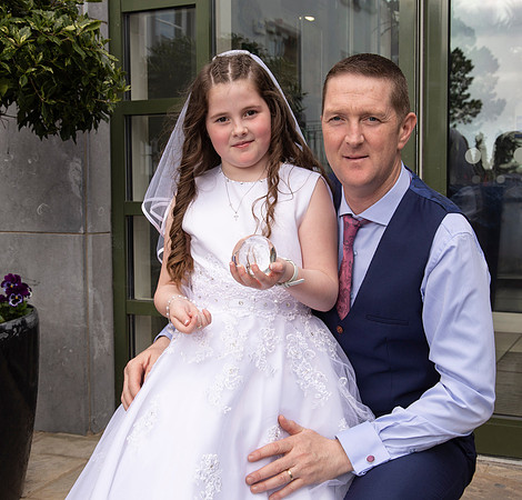 Young girl in her First Communion dress photographed at Talbot Hotel Ballincollig, Cork, Ireland by FlashFocus.org