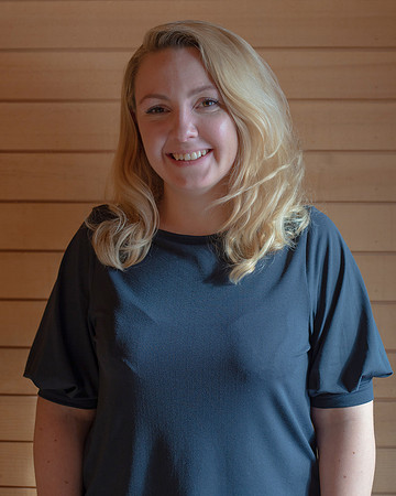 Professional headshot portrait of Carina