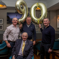 Family and friends celebrating together at a 90th birthday in Cork, Ireland.