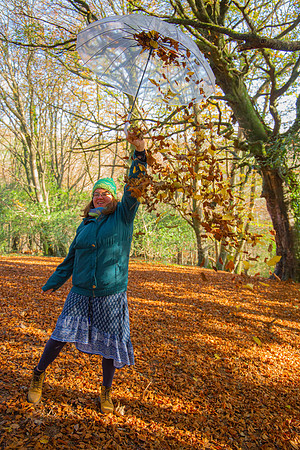 Portrait of Julia in autumn leaves